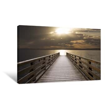 Image of Wooden Pier On The Sea In Front Of A Fiery Sunset Canvas Print