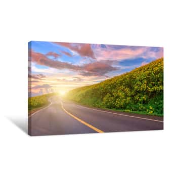 Image of Empty Asphalt Road Through Mexican Sunflower Flower Field To Sunset Sky At Mae Hong Son Province, Thailand Canvas Print