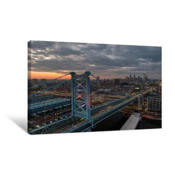 Image of Philadelphia At Night, Aerial View Of Skzline At Sunset With Benjamin Franklin Bridge And Waterfront, Skyscrapers Dominating Cityline Against Dramatic Sky Canvas Print
