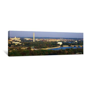 Image of This Is An Aerial View Of Washington, DC With The Jefferson Memorial, U S  Capitol, Washington Monument, And Lincoln Memorial  The Potomac River Runs Through The Center With The Key Bridge At Right At Sunset  There Is Green Foliage Of The Spring As Well C