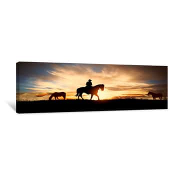 Image of A Silhouette Of A Cowboy And Horse At Sunset Canvas Print