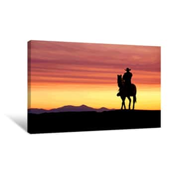 Image of Cowboy On Horse At Sunset In The American West Canvas Print