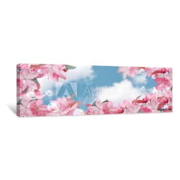 Image of Pink Sakura Flowers And Soap Bubbles Against The Clouds Sky Canvas Print