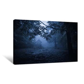 Image of Old Haunted Wooden House, Spooky Misty Foggy Forest, Halloween Holiday Celebration Background Concept, Located In Transylvania, Romania Canvas Print