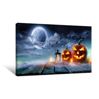Image of Jack O’ Lanterns Glowing At Moonlight In The Spooky Night - Halloween Scene Canvas Print