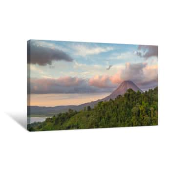 Image of Arenal Volcano At Sunrise In Costa Rica, As The Sun Reflects On The Newly Formed Clouds Canvas Print