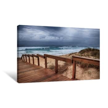 Image of Wooden Pathway On The Beach By The Breathtaking Ocean Waves Under The Cloudy Sky Canvas Print