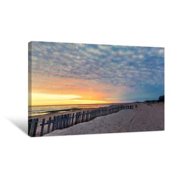 Image of Fence On Sand Beach At Sunset In Chipiona Canvas Print