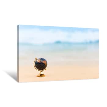 Image of World Travel Concept  Globe On The Beach Canvas Print