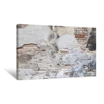 Image of Old Brick Wall With Damaged Stucco And Paint Layers Canvas Print