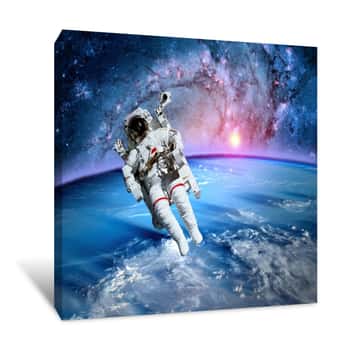 Image of Astronaut Spaceman Outer Space Fantasy Orbit Planet Earth Sun  Elements Of This Image Furnished By NASA Canvas Print