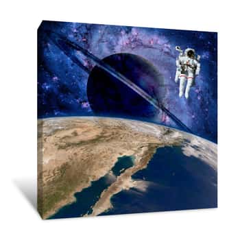 Image of Earth Astronaut Planet Outer Space Saturn Spaceman Cosmonaut  Elements Of This Image Furnished By NASA Canvas Print
