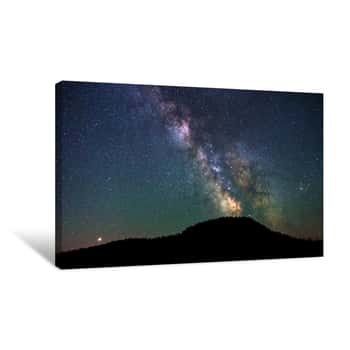 Image of Colorful Vibrant Milkyway Galaxy With Stars And Space Dust In The Universe Above The Dark Hill On Night Sky Canvas Print