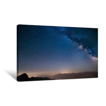Image of Glowing Milky Way And Starry Sky From The Alps Canvas Print