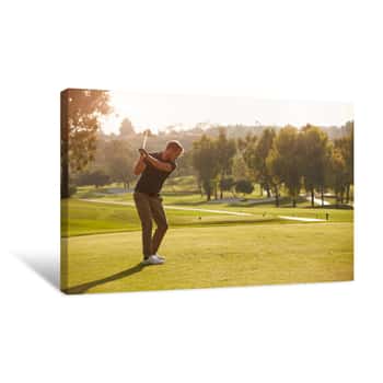 Image of Male Golfer Lining Up Tee Shot On Golf Course Canvas Print
