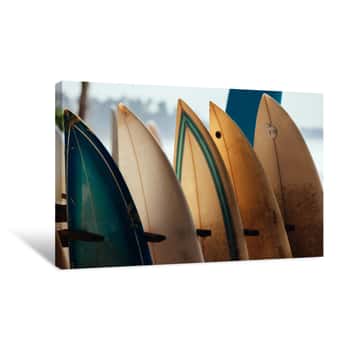 Image of Set Of Different Color Surf Boards In A Stack By Ocean  WELIGAMA  Surf Boards On Sandy Weligama Beach In Sri Lanka  On Weligama Beach Surf Is Available All Year Around For Beginner And Advanced Canvas Print