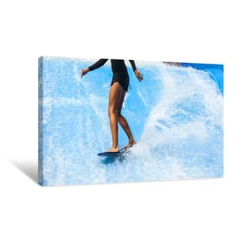 Image of Girl On Black Swimsuit Surfing On Wave Pool With Small Board In The Island Of Phuket, Thailand Canvas Print