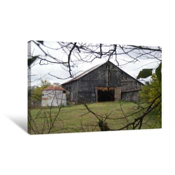 Image of Old Barn In Distance With Branches Border Canvas Print