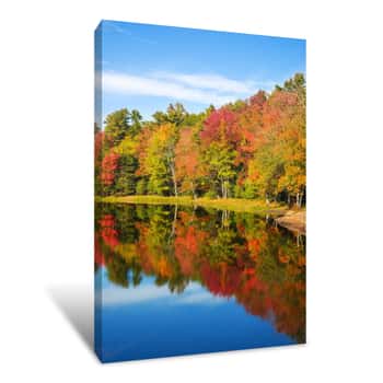 Image of Colorful Foliage Reflections In Pond Water On A Sunny Autumn Day In New England Canvas Print