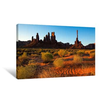Image of Beautiful View Of Amazing Sandstone Formations In Famous Sunrise At Totem Pole, Monument Valley, Arizona, USA Canvas Print