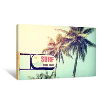 Image of Vintage Surf Beach House Signage And Coconut Palm Tree On Tropical Beach Blue Sky With Sunlight Of Morning In Summer,  Instagram Retro Filter Canvas Print
