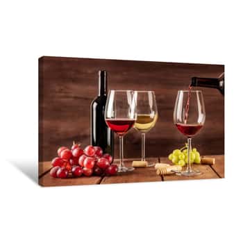 Image of Red Wine Poured Into Glass From Bottle With Copy Space Canvas Print