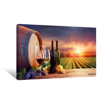 Image of Bottles And Wineglasses With Grapes And Barrel In Rural Scene Canvas Print