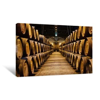 Image of Old Aged Traditional Wooden Barrels With Wine In A Vault Lined Up In Cool And Dark Cellar In Italy, Porto, Portugal, France Canvas Print