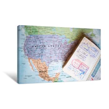 Image of (Selective Focus) A Passport With Entry Stamps Is On A Blurred Geographical Map Of The World  The Map Shows The United States An Mexico Canvas Print