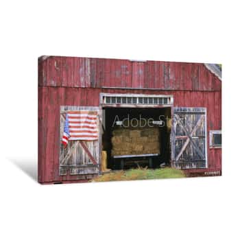 Image of American Flag Hanging From A Barn Door Canvas Print