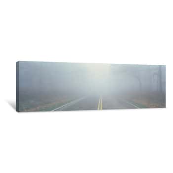 Image of This Is Fossy Road In A Fog   It Signifies Hazardous Driving Conditions As You Can Only See A Few Feet Of The Road And The Way Ahead Is Obscured By The Fog Canvas Print