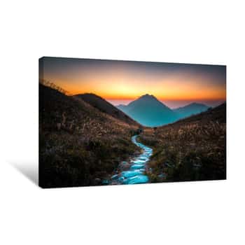 Image of Beautiful Shot Of A Narrow Path Surrounded By Greenery In The Hills At Sunset Canvas Print