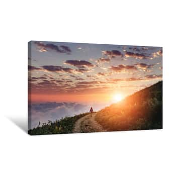 Image of Woman On Trail Admiring The Sunset With Clouds And Fog Canvas Print