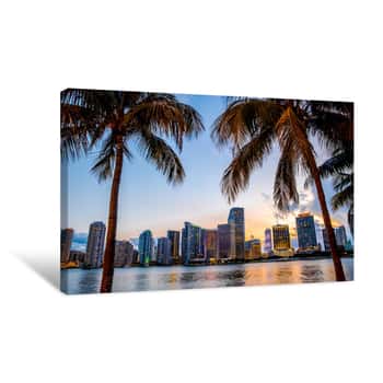 Image of Miami, Florida Skyline And Bay At Sunset Seen Through Palm Trees Canvas Print