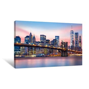 Image of Brooklyn Bridge At And The Lower Manhattan Skyline Under A Purple Sunset Canvas Print