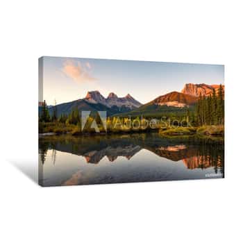Image of Scenery Of Three Sisters Mountains Reflection On Pond At Sunrise In Autumn At Banff National Park Canvas Print