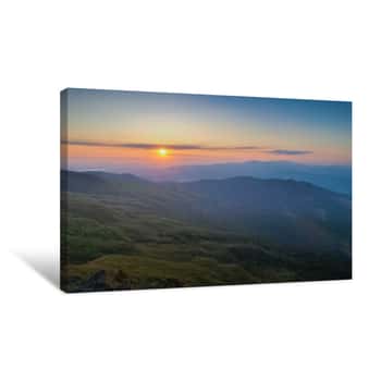 Image of Mountain View Morning Above Many Hills And Green Forest Around With Soft Fog With Colorful Red Sun Light In The Sky Background, Sunrise At Top Of Phu Langka Forest Park, Phayao, Thailand Canvas Print