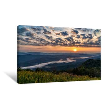 Image of Mountain At Sun Rising Giving A Beautiful Color On The Mist Canvas Print