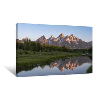 Image of A Sunrise Shot Of Grand Teton And A Stream At Schwabacher Landing In Grand Teton National Park In The United States Canvas Print