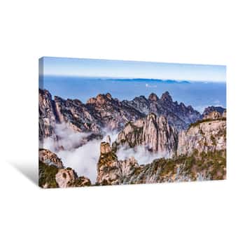 Image of Clouds Above The Mountain Peaks Of Huangshan National Park Canvas Print