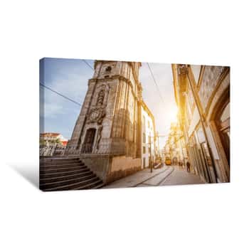 Image of Street View With Clerics Church Tower With Retro Tram During The Sunrise In Porto City, Portugal Canvas Print