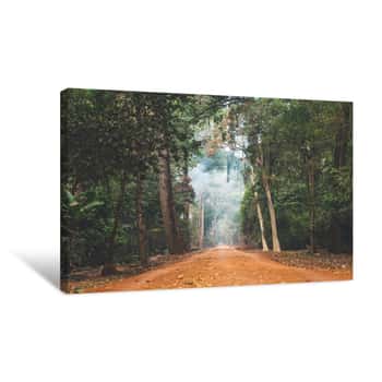 Image of Dirt Road Stretching Through Cambodian Jungle Canvas Print