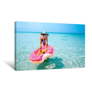 Image of Woman With Inflatable Ring On Beach Canvas Print