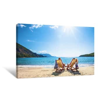 Image of Happy Couple Relaxing On The Beach Canvas Print