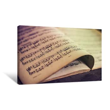Image of Music Sheets On Wooden Background Canvas Print