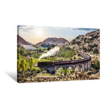 Image of Glenfinnan Railway Viaduct In Scotland With The Jacobite Steam Train Against Sunset Over Lake Canvas Print