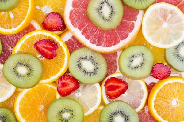 Sliced Fruits Background Wall Mural