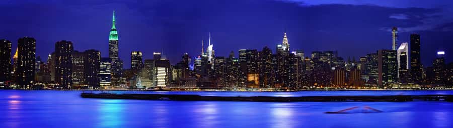NYC skyline with the empire state building in a blue hue wall mural