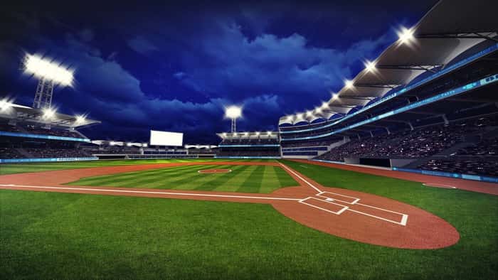 Illuminated Modern Baseball Stadium With Spectators And Green Grass Wall Mural